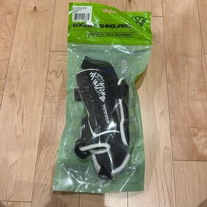New SOCCER  SLIP IN SHINGUARDS-size XXS